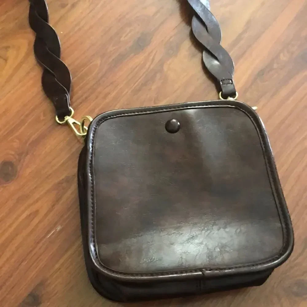 Anthropologie Tortoiseshell brown Crossbody bag.